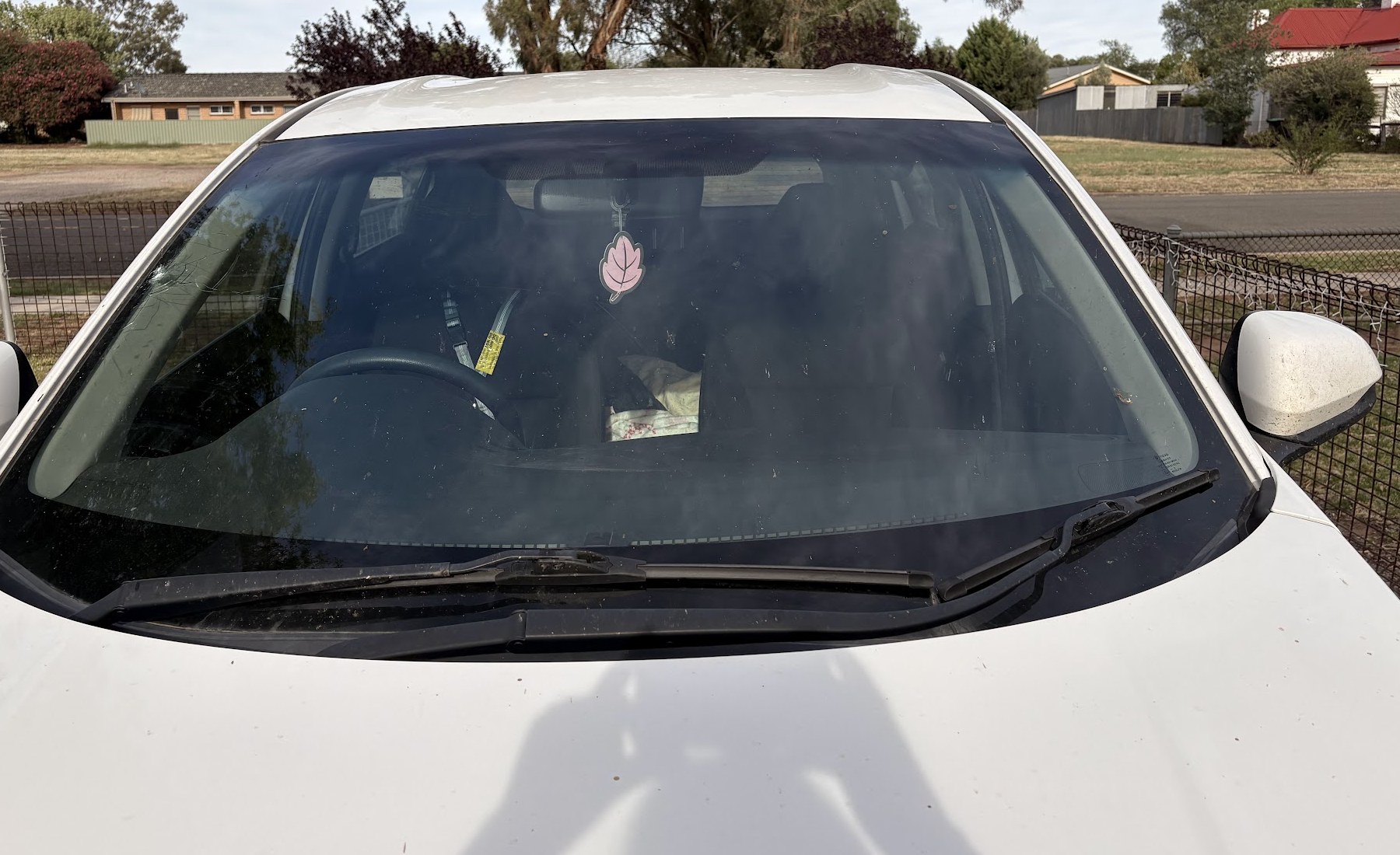 A car windscreen with stone chip damage