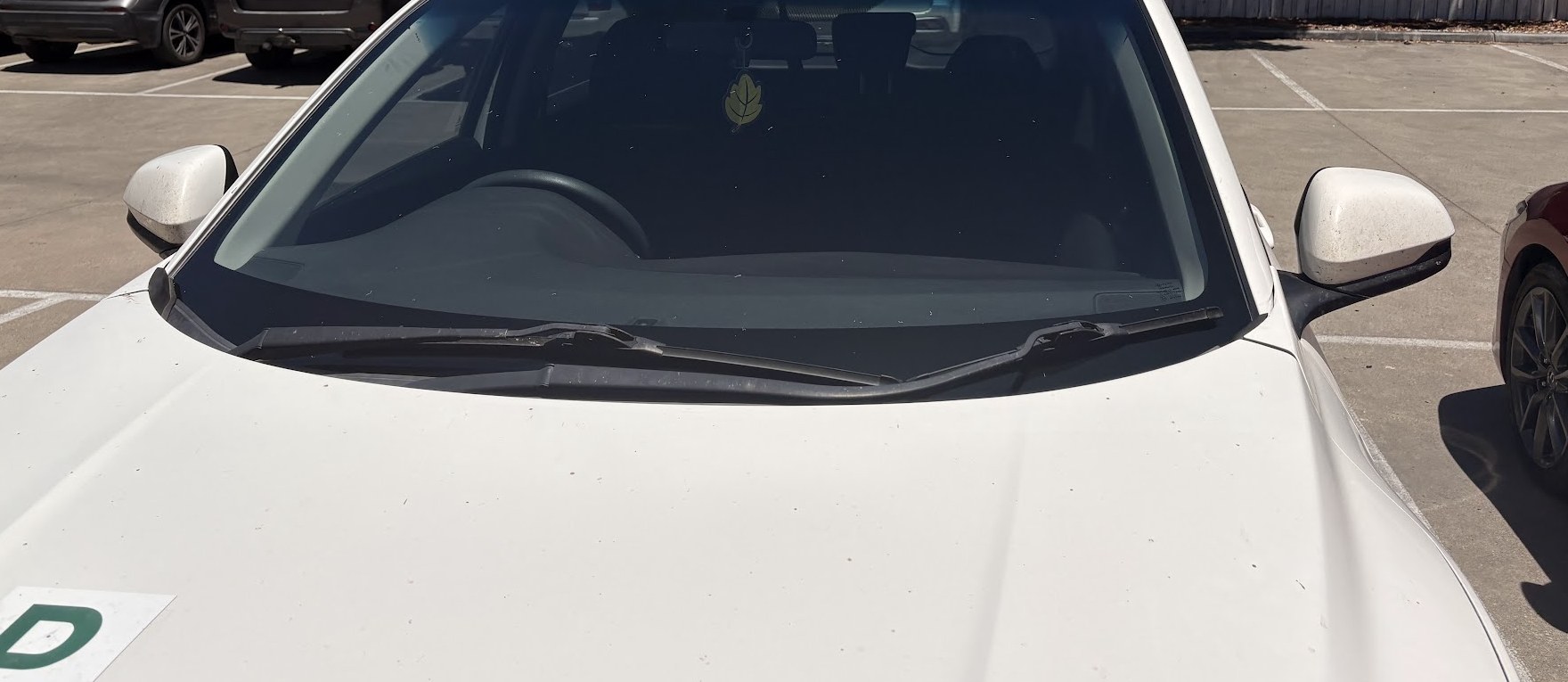A car with a clear, newly fitted windscreen